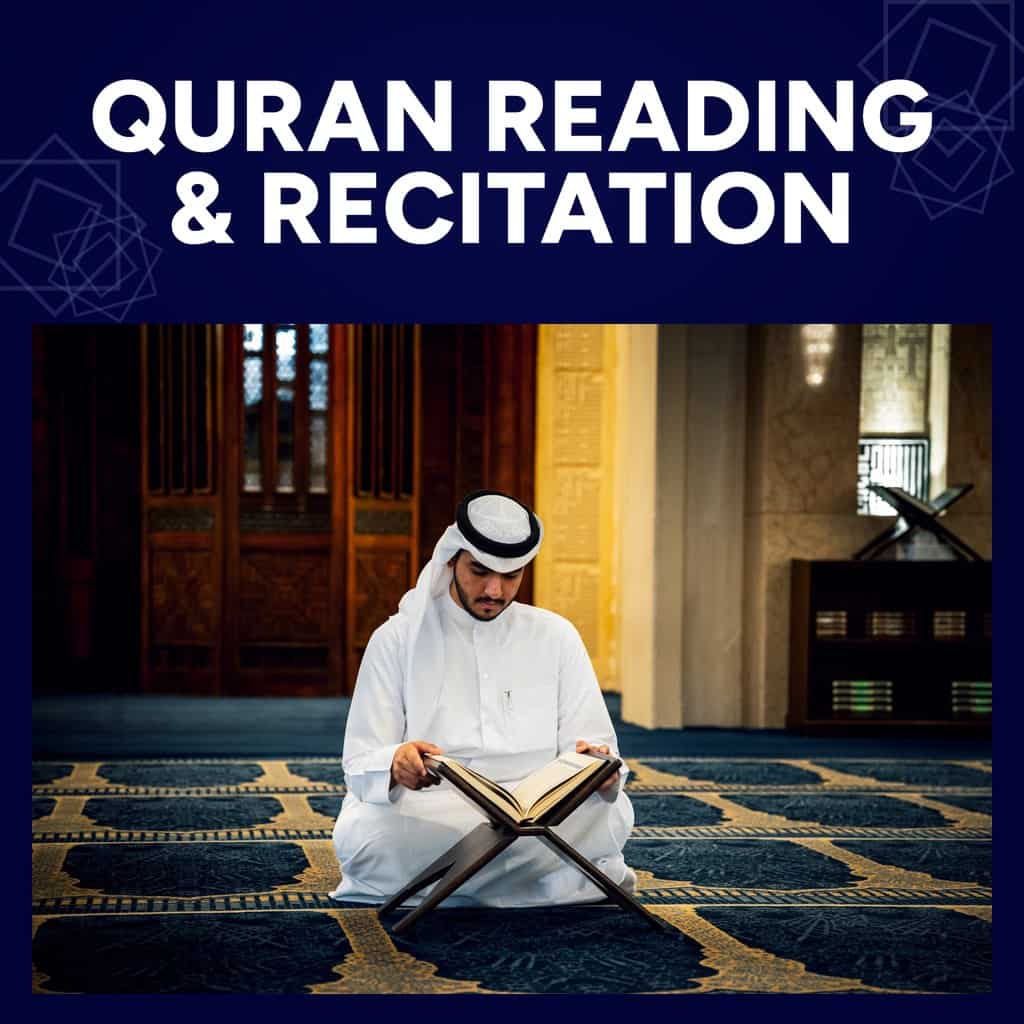 Quran Reading and Recitation course: a man in a white thobe reading the Quran on a wooden stand in a mosque